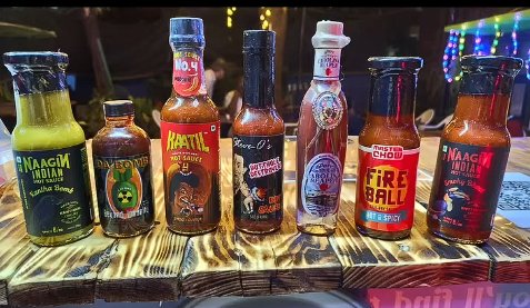QnQ's lineup of hot sauces on the party table
